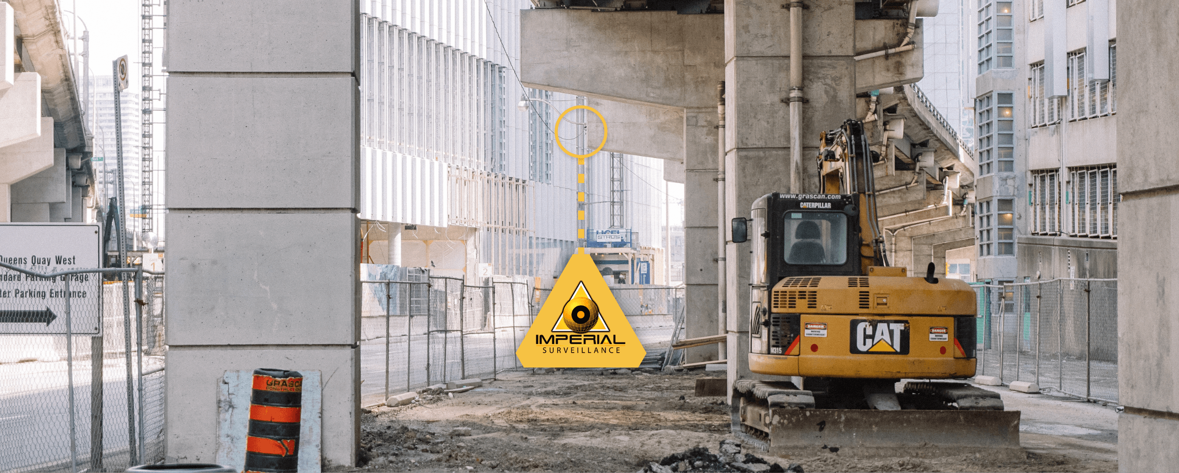 Construction site under a concrete overpass with an excavator, with a camera highlighted by an Imperial Surveillance callout