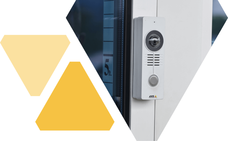 White rectangular camera with speaker built-in affixed to an entry door